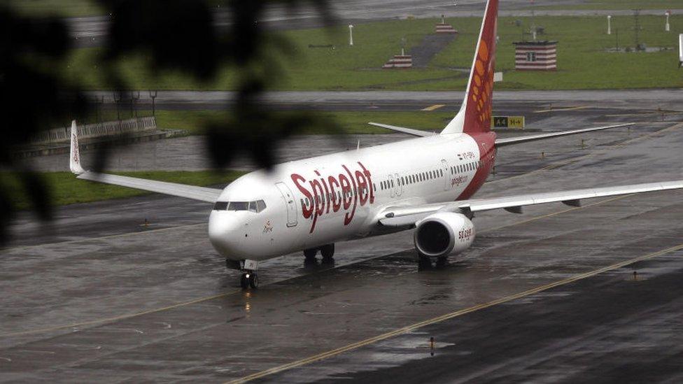 An aircraft from Indian carrier SpiceJet taxis towards take-off at the domestic airport in Mumbai on 15 July 2008