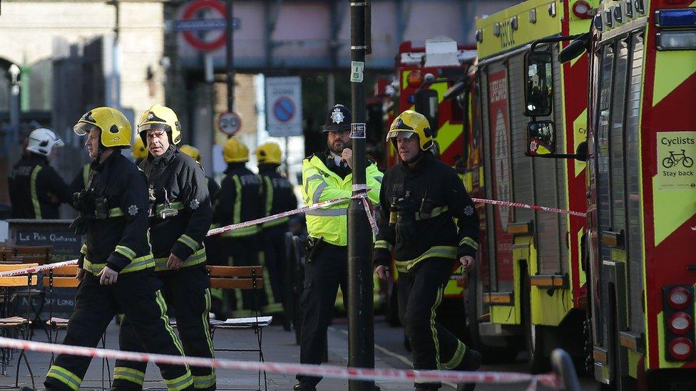 Firefighters outside Parsons Green