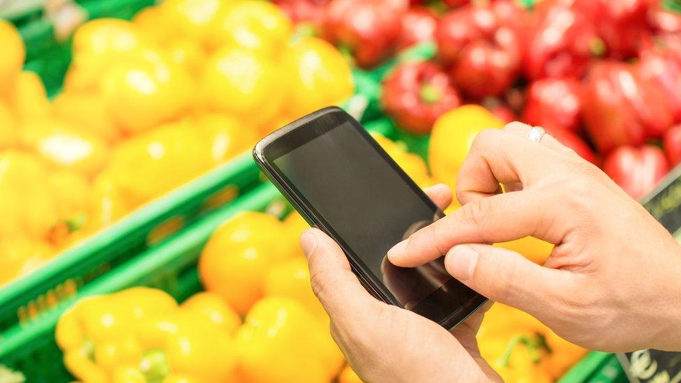 Phone and vegetables