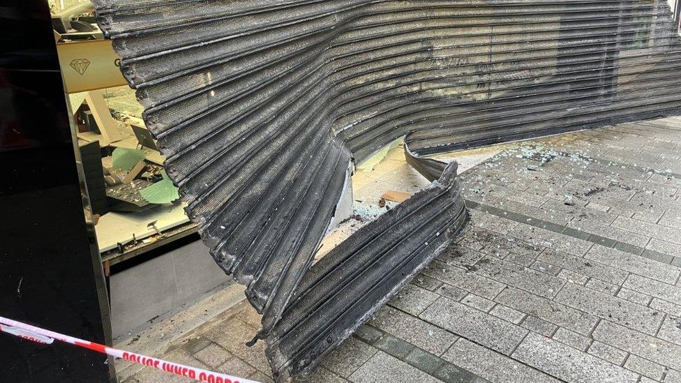 Damaged shutter of jewellers in Newry