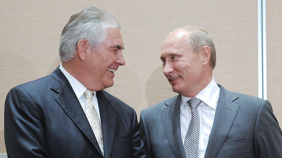 Russia's Prime Minister Vladimir Putin (L) speaks with ExxonMobil President and Chief Executive Officer Rex Tillerson during the signing of a Rosneft-ExxonMobil strategic partnership agreement in Sochi on August 30, 2011. Russia's oil champion Rosneft and US ExxonMobil clinched a global deal worth up to half-a-trillion dollars that will see the US supermajor take BP's place in pioneering Arctic exploration work.