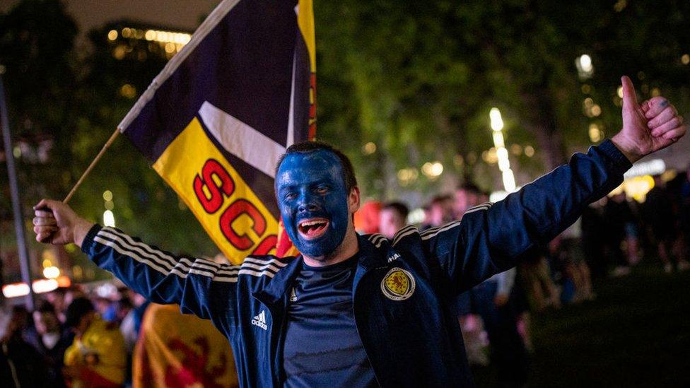 fan celebrating in London