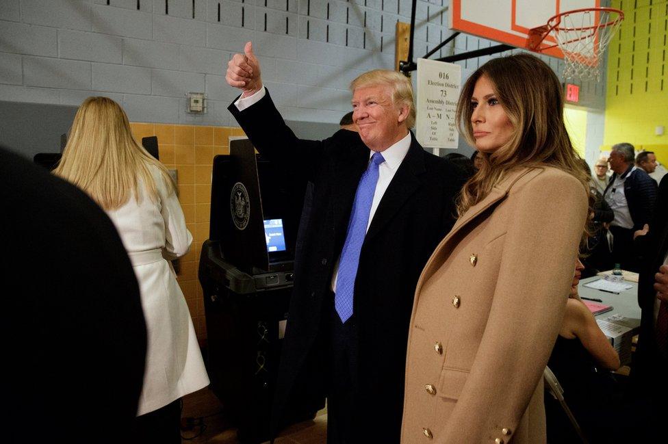 Republican presidential candidate Donald Trump, accompanied by his wife Melania in New York