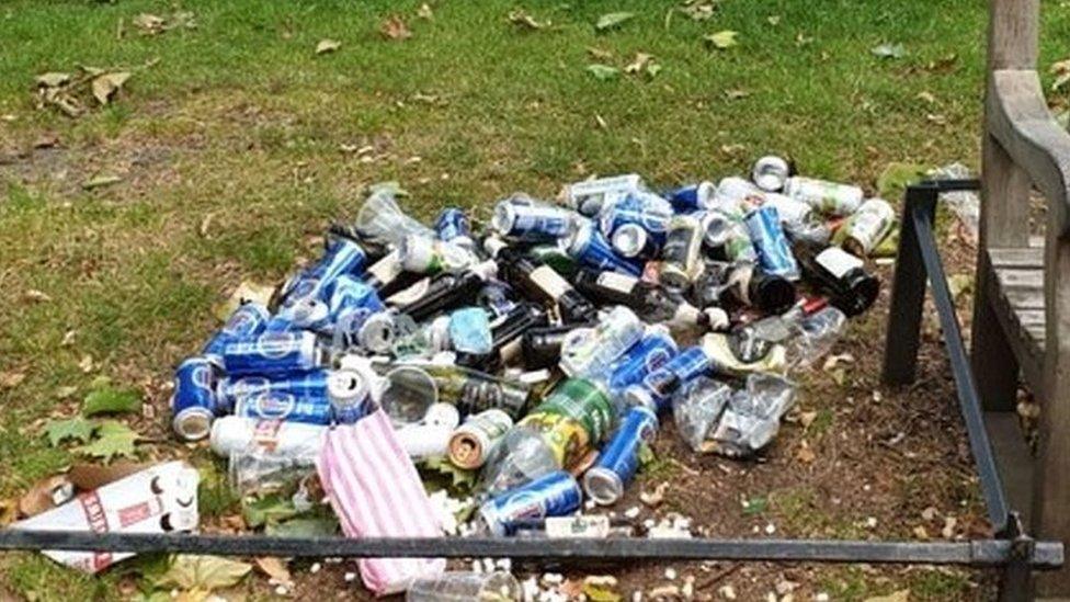 Litter by bench in St James' Park