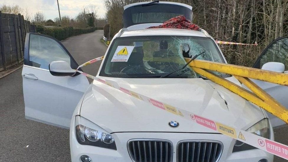 Tip barrier smashes into car in Oadby, Leicestershire