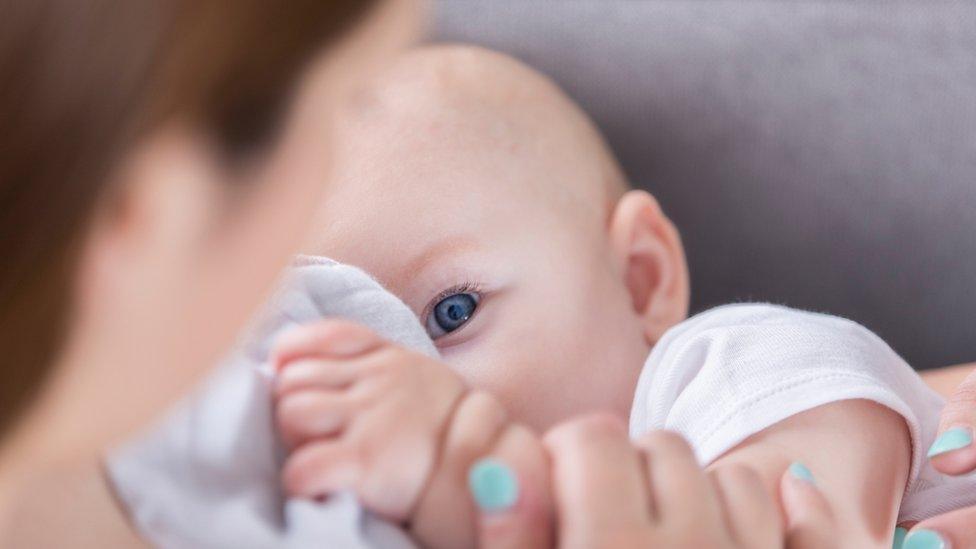 Anonymous mother and baby