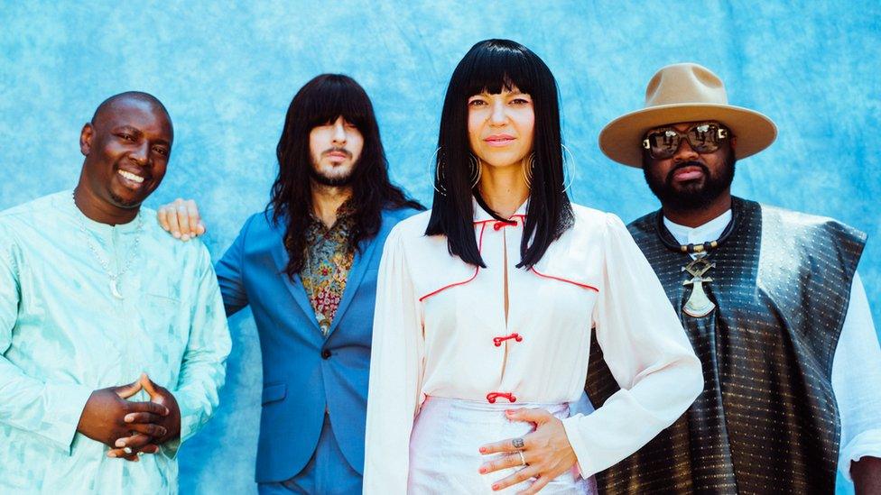 Vieux Farka Touré (left) with the members of Khruangbin: Mark Speer, Laura Lee Ochoa and Donald Johnson