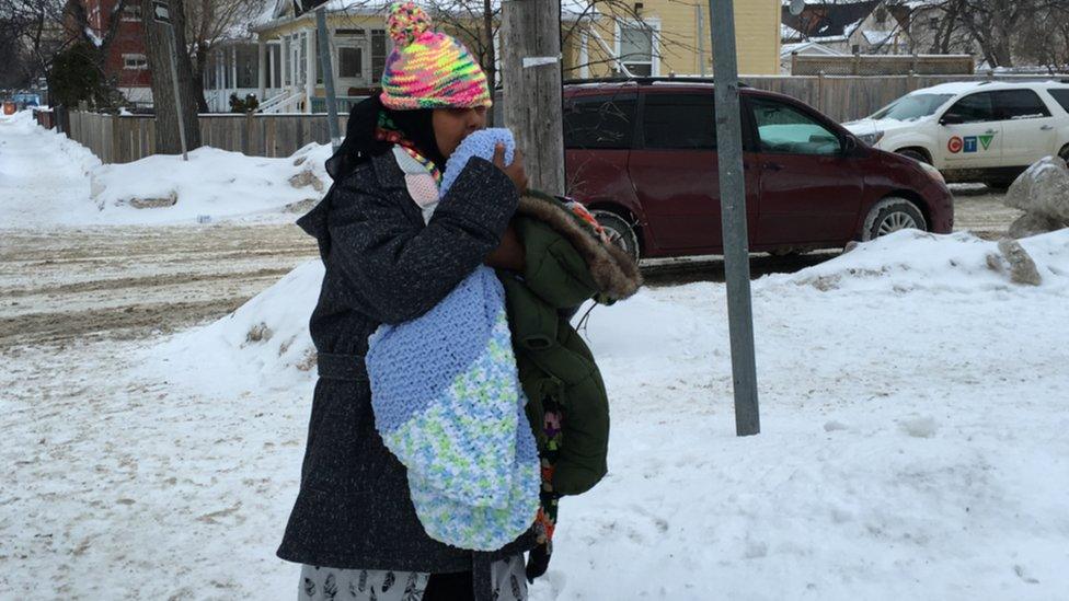 A refugee claimant arrives at Welcome Place settlement agency n Winnipeg