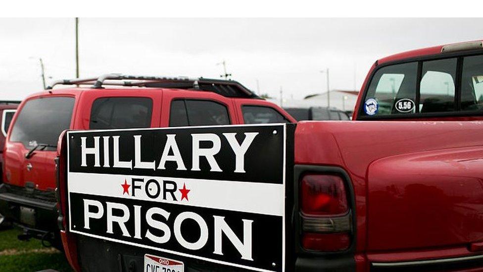 A Hillary For Prison sign is attached to a pickup truck at a rally held by Republican presidential nominee Donald Trump on October 27, 2016 in Springfield, Ohio.