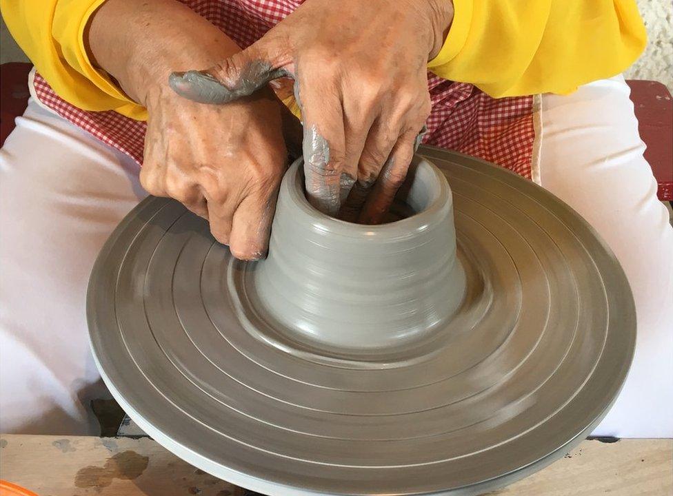 Meena Vohra at her potter's wheel