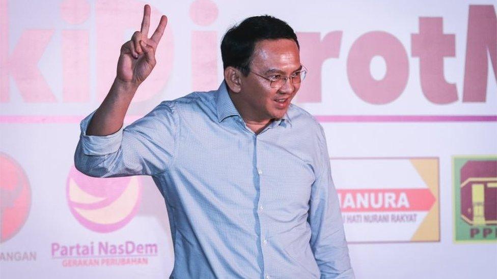 Jakarta's incumbent governor Basuki "Ahok" Tjahaja Purnama gestures shortly before speaking to journalists in Jakarta, Indonesia, 19 April 2017.