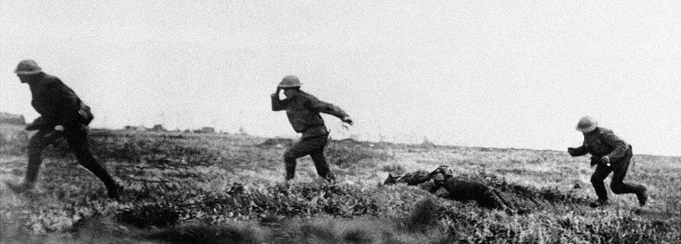 British soldiers crossing a battlefield during the Battle of Cambrai