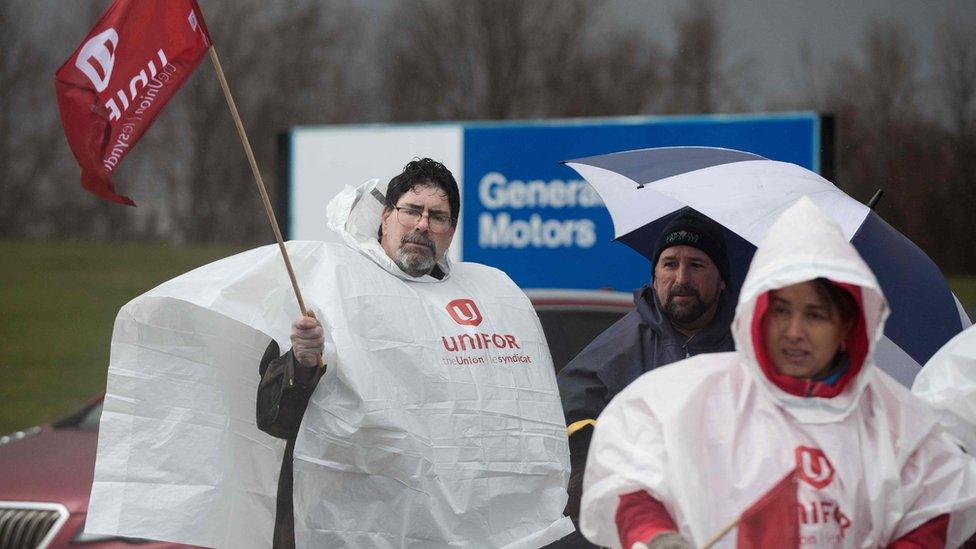 Labour union members block gate 1 of the General Motors Oshawa plant in Oshawa, Ontario, on November 26, 2018. -