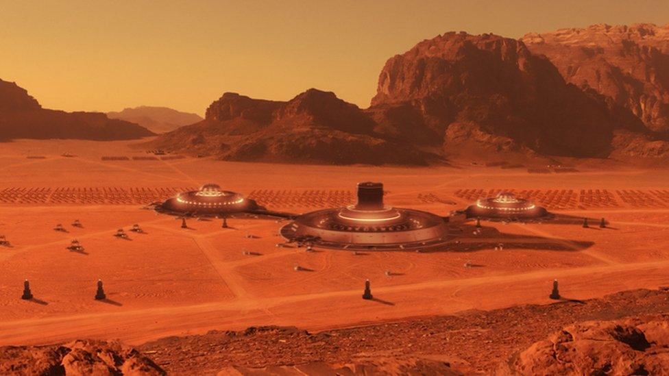 A computer generated image of huge spaceports set up on Mars