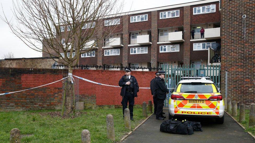 FEBRUARY 06: Police officers at the scene of a fatal stabbing on Wisbeach Road on February 6, 2021 in Croydon, England. A 22-year-old died after an incident at a residential address.