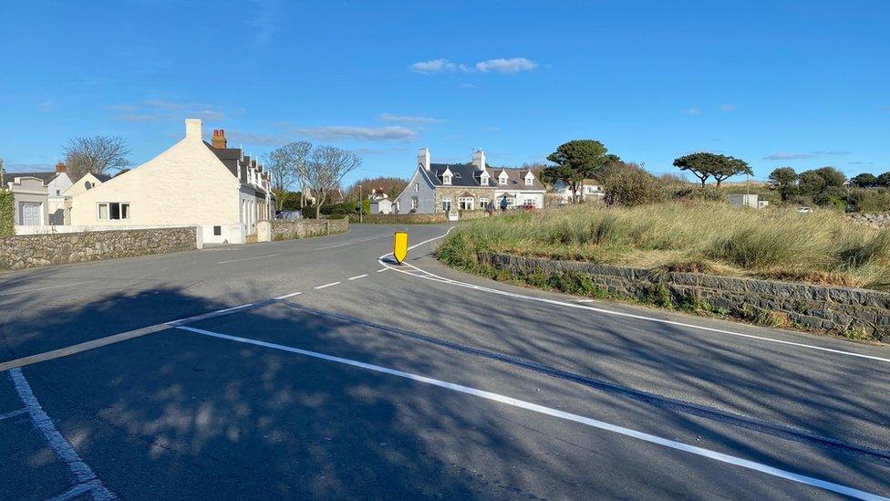 New road markings and boulder