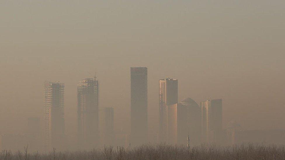 Buildings in Beijing's central business district shrouded in heavy smog