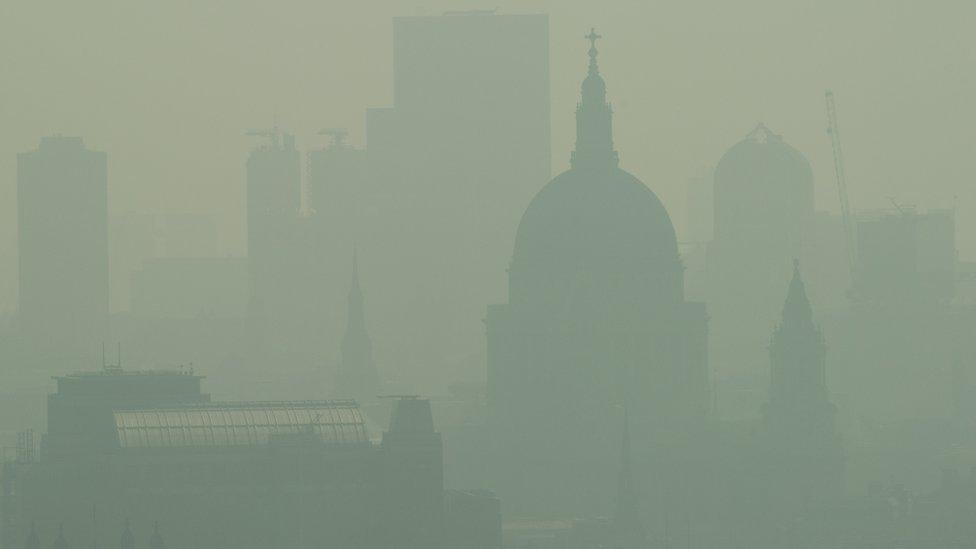 Mist and pollution hang over the London skyline