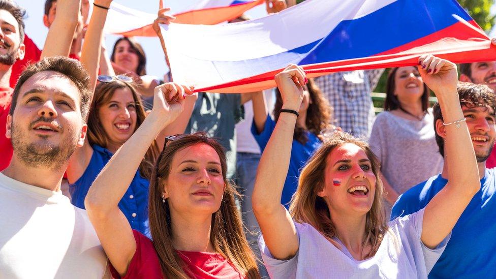 Smiling Russian football fans