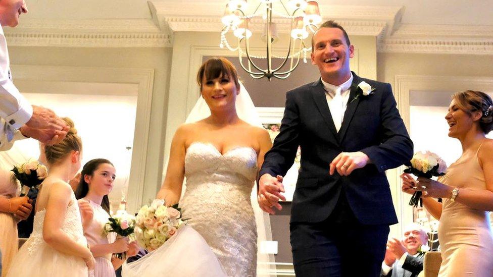 Craig and Kirsty Williams walking down the aisle