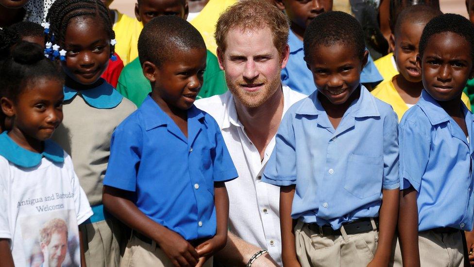 Prince Harry with school children