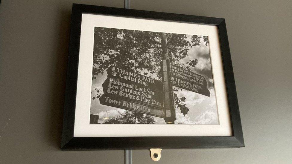 Image of sign post to London destinations, displayed in Greggs in Richmond North Yorkshire