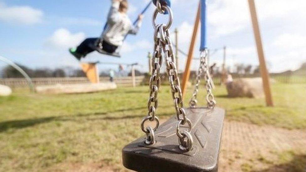 child on swing