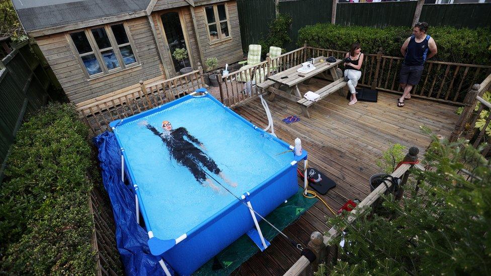 Triathlete Lloyd Bebbington trains in a pool