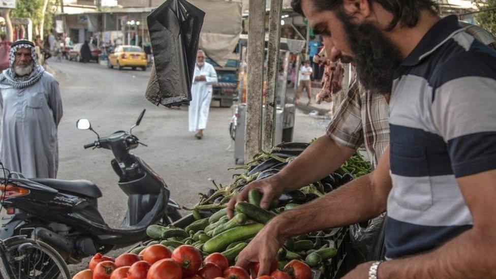 An IS media scene of Sumer market in south-eastern Mosul