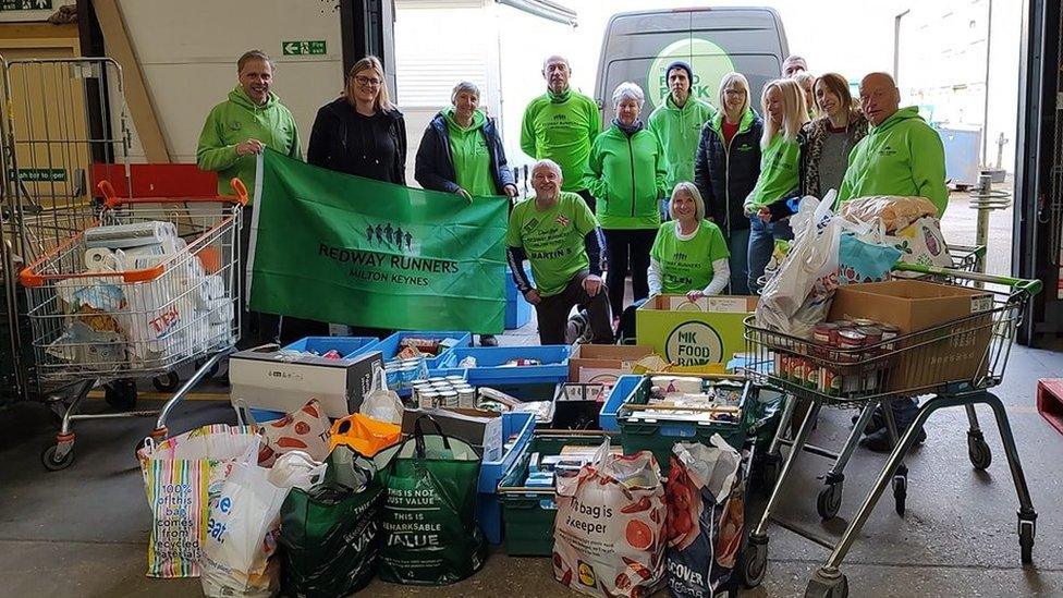 Members of Redway Runners with their donations to MK Food Bank