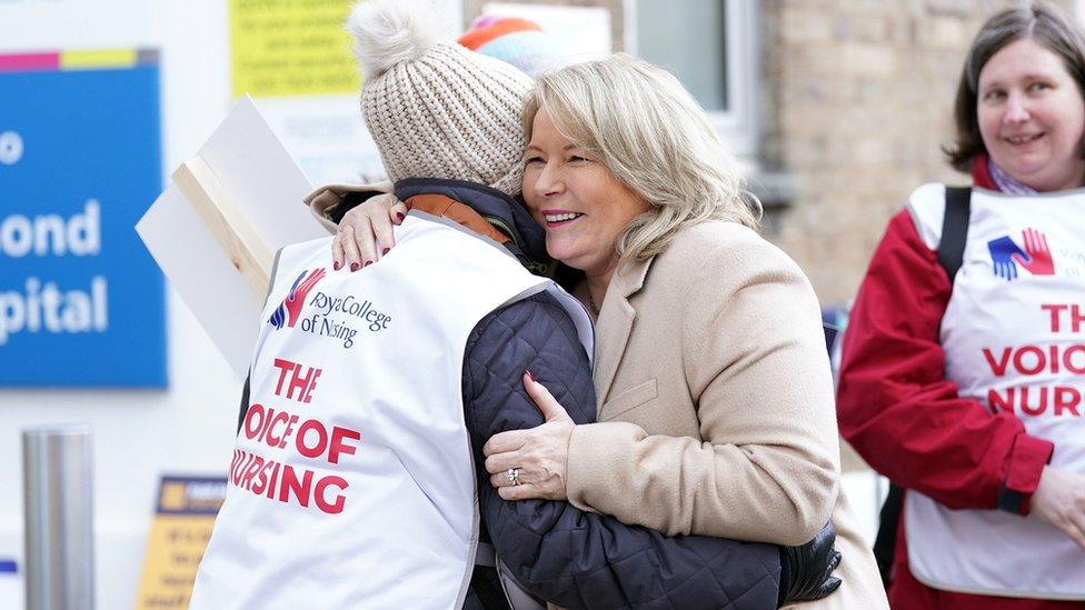 Pat Cullen, general secretary of the Royal College of Nursing, hugging a union member outside Great Ormond Street Hospital