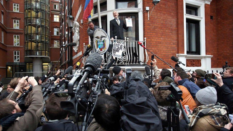 Julian Assange addresses a crowd outside the Ecuadorean embassy