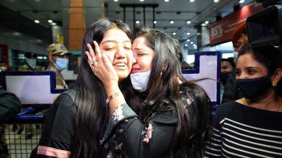 Stranded Indian students amid the Ukraine invasion by Russia, reunited with their family upon arrival, at Indira Gandhi International Airport on February 28, 2022 in New Delhi, India.