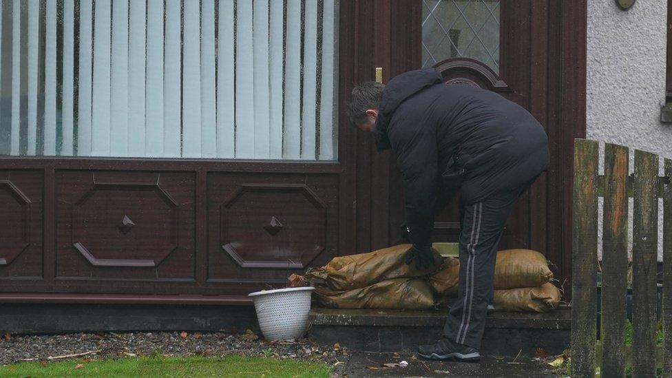 man with sandbags in Brechin