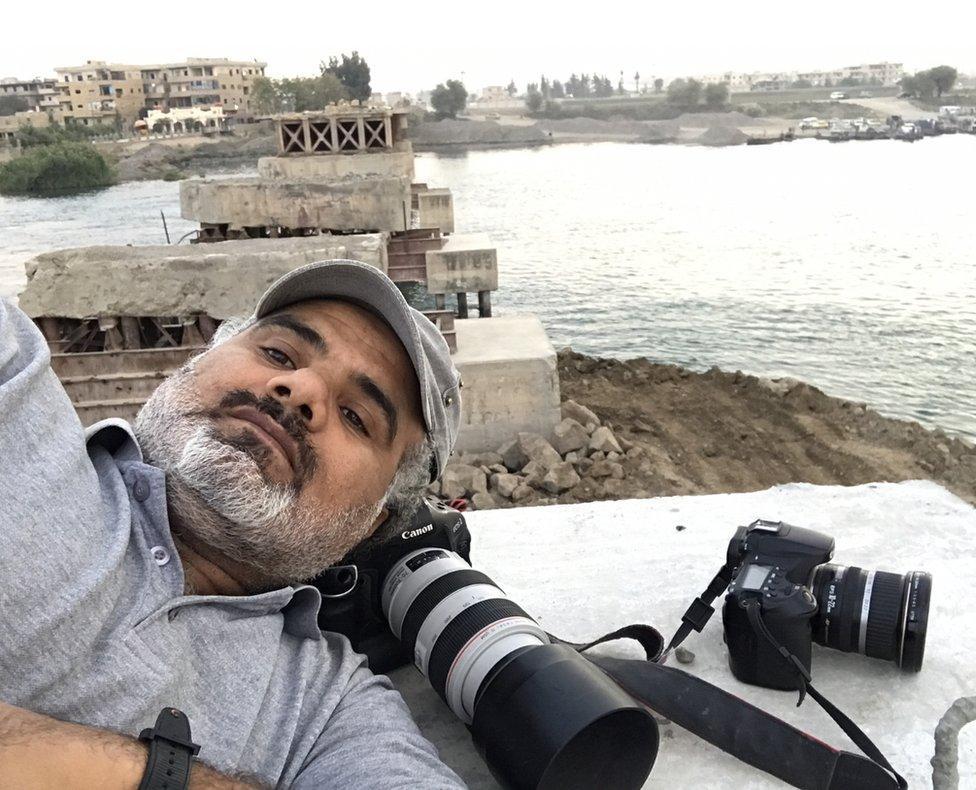 Abood Hamam on ruined bridge