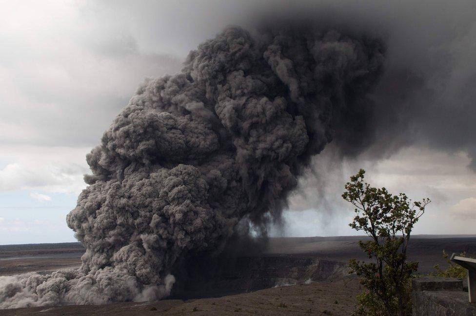 This US Geological Survey (USGS) image released on 15 May 2018 shows an ash plume rising following a massive volcano eruption on Kilauea volcano in Hawaii