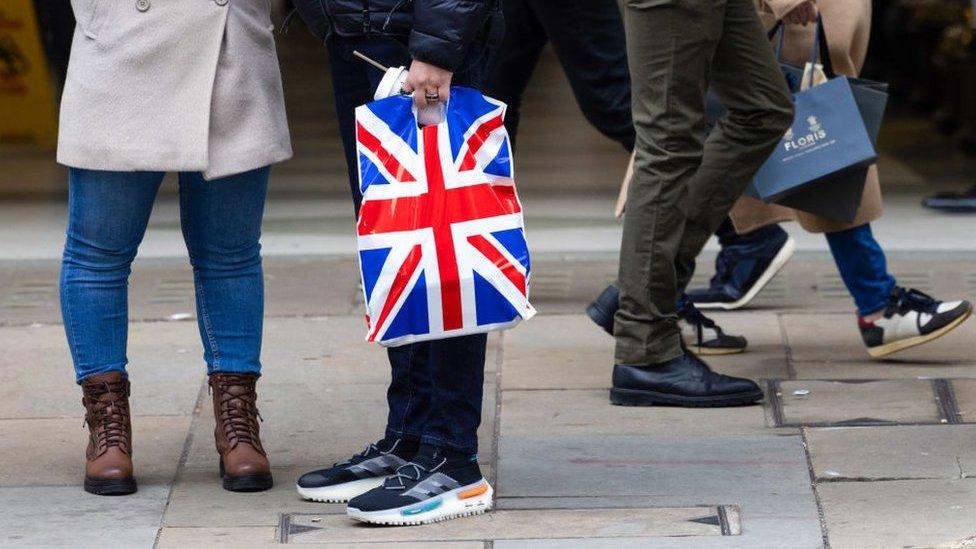 Shoppers walking on a High Street