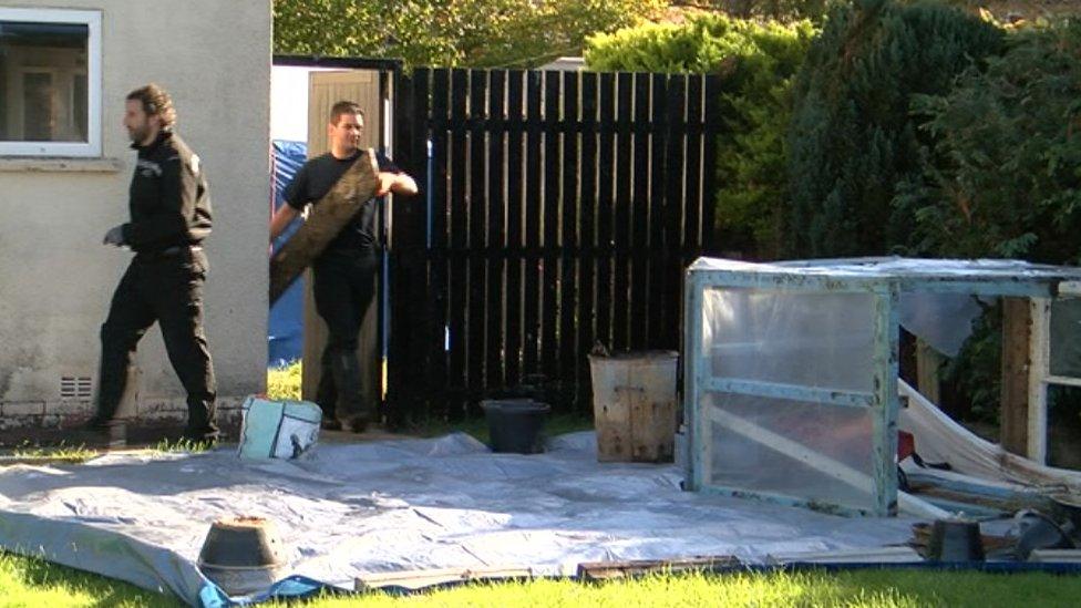 Police search property