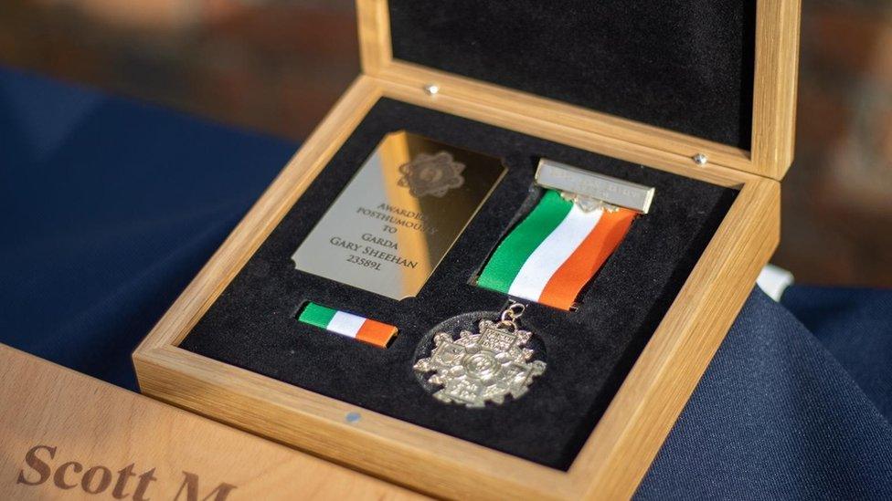 The Scott Medal awarded posthumously to Garda Gary Sheehan in a display box