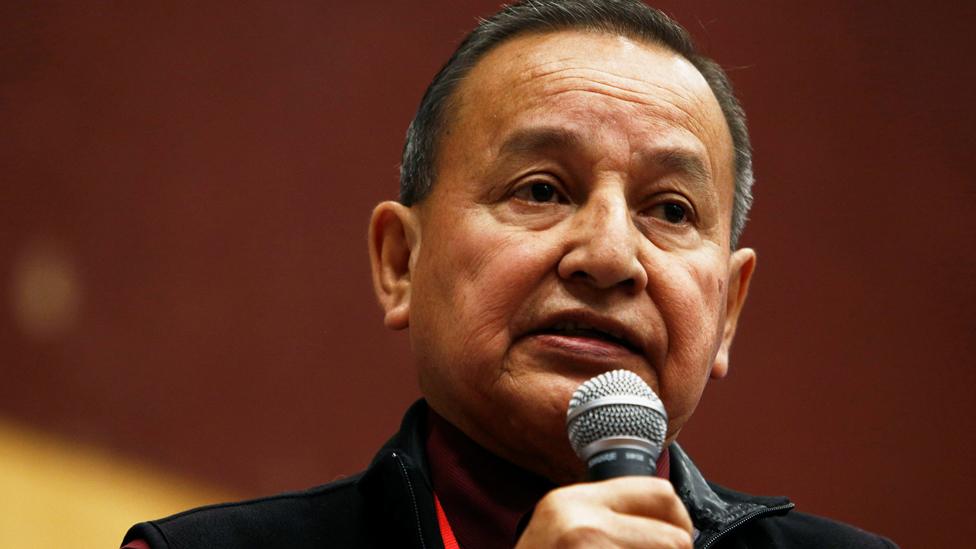 Grand Chief Stewart Phillip speaks to First Nations leader before signing the Treaty Alliance Against Tar Sands Expansion during an announcement on oil sands pipelines, with