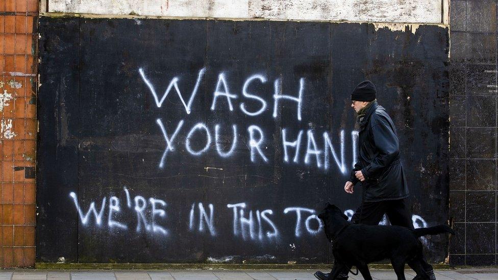 Wash your hands graffiti in Belfast