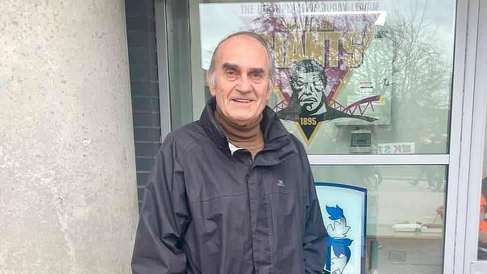 A recent photograph of Dick Krzywicki attending a Huddersfield Town game