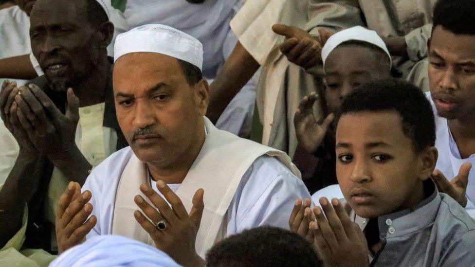 People praying during Eid in Khartoum.