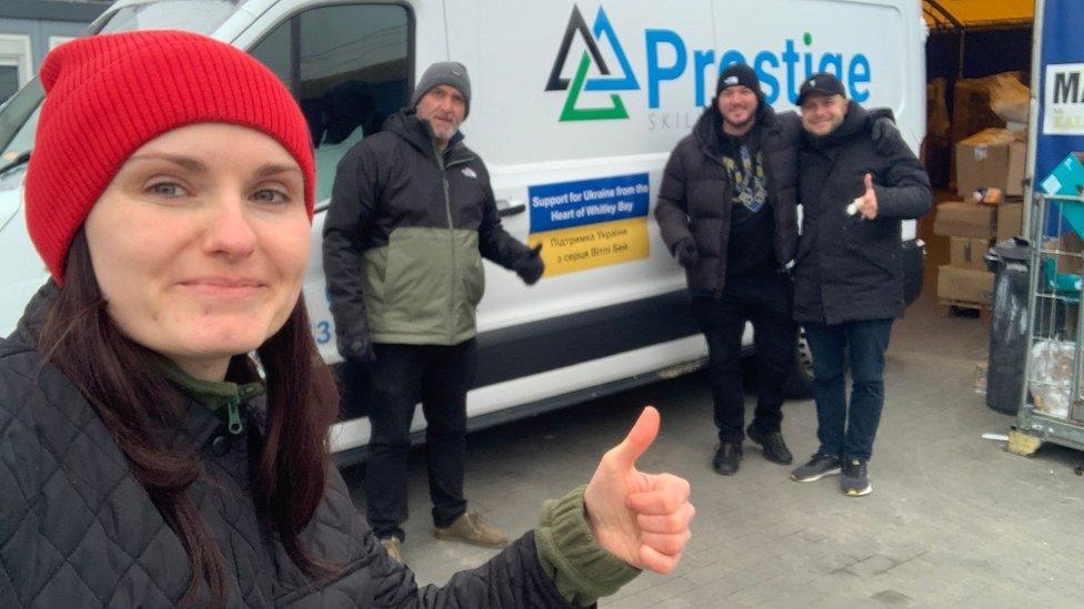 Iryna and a van loaded with aid donations for Ukraine