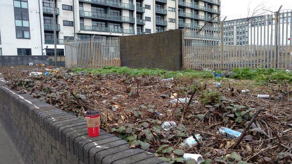 rubbish in grounds of new homes