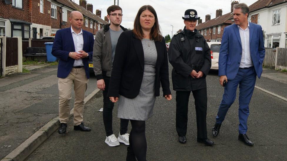 Emily Spurrell (centre) with local councillors, Steve Rotheram (right) and Serena Kennedy (second from right)