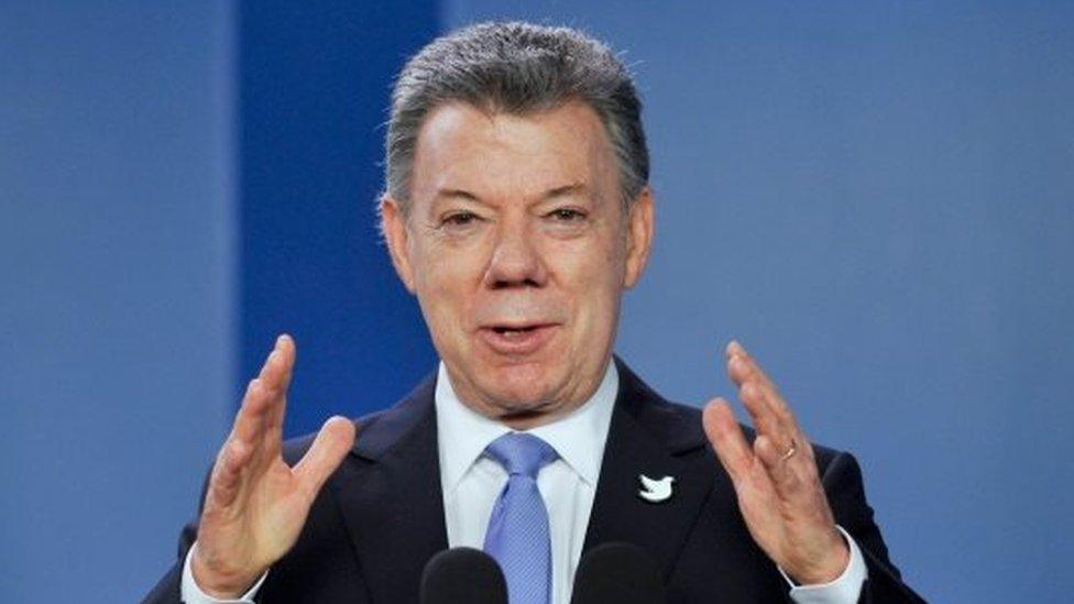 Colombian President Juan Manuel Santos gestures during a press conference at Narino presidential Palace in Bogota, on June 15, 2016.