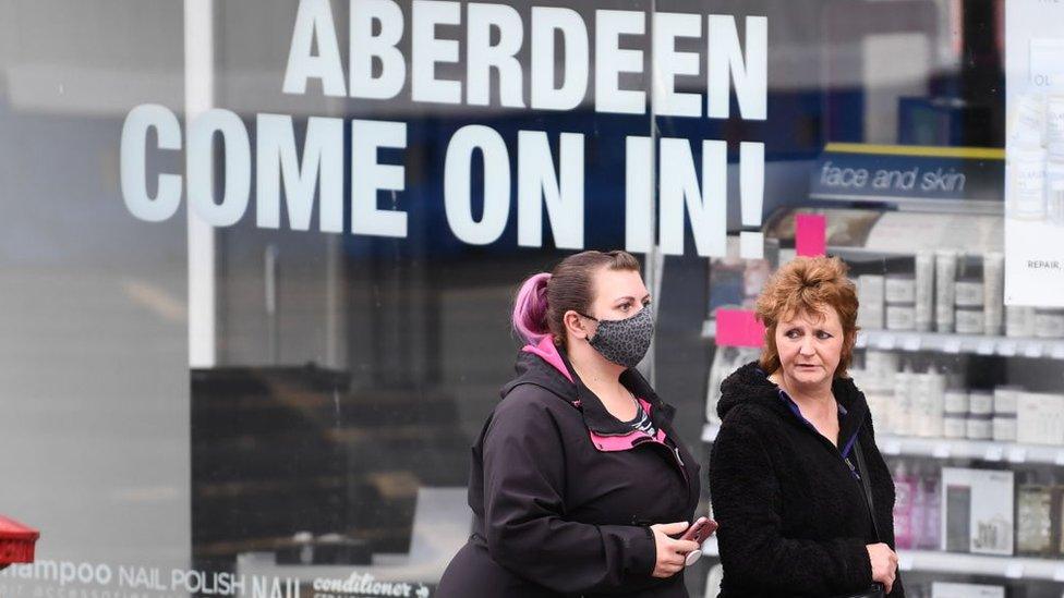 women walking in aberdeen