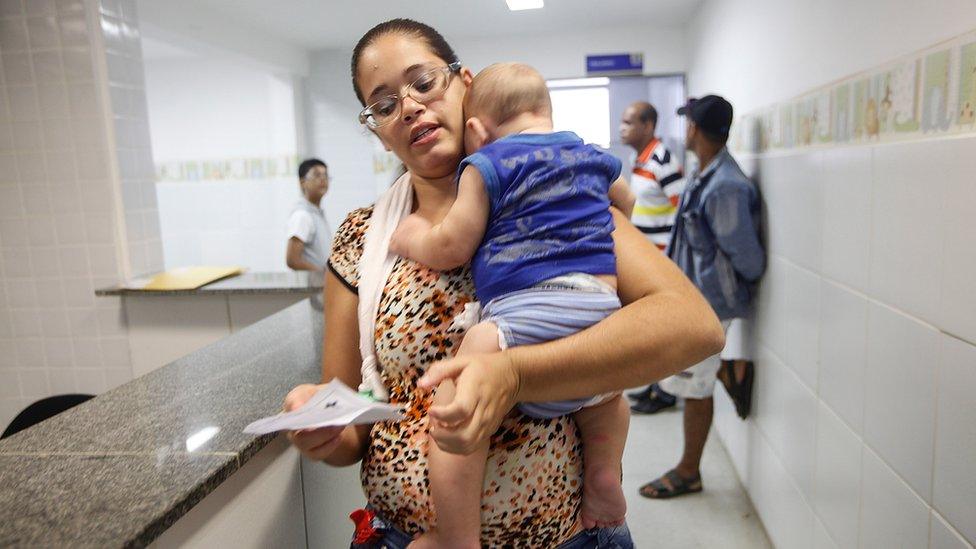 Mother and her baby at a clinic in Brazil