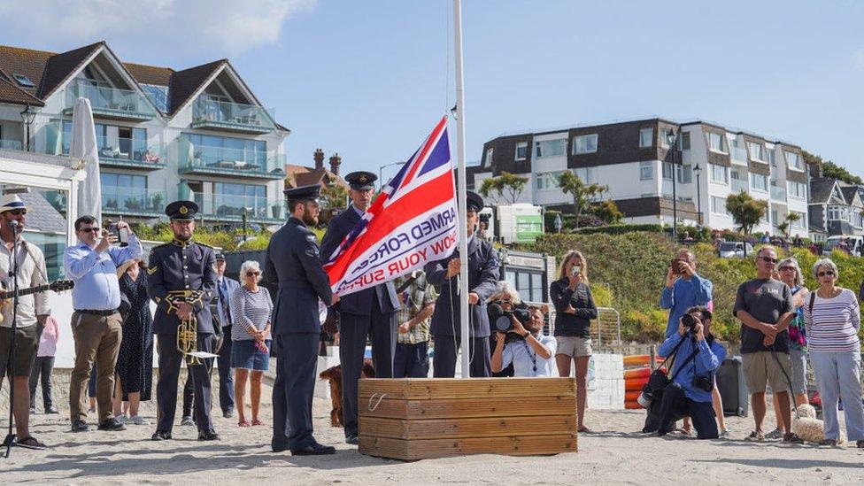 people-at-flag-raising-ceremony.